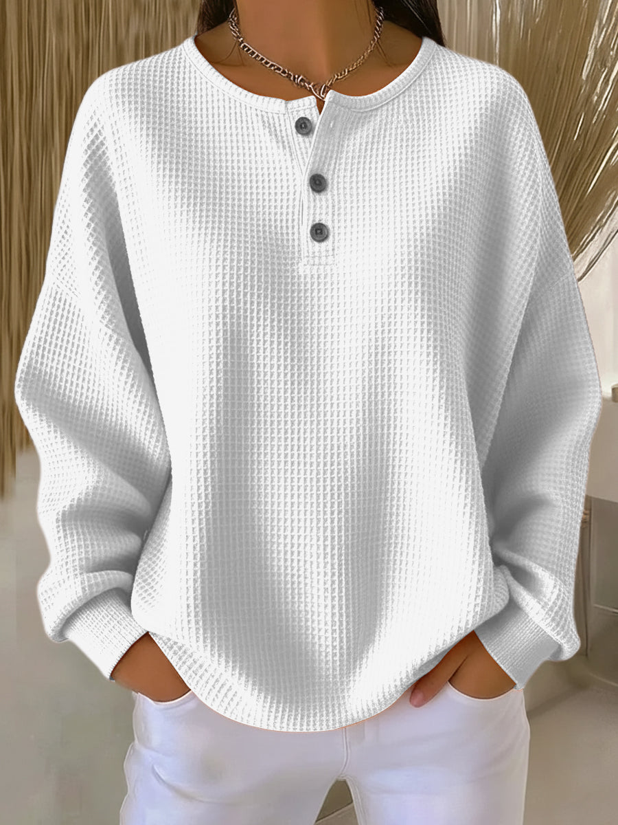 Mira – Gebreide top met knoopsluiting