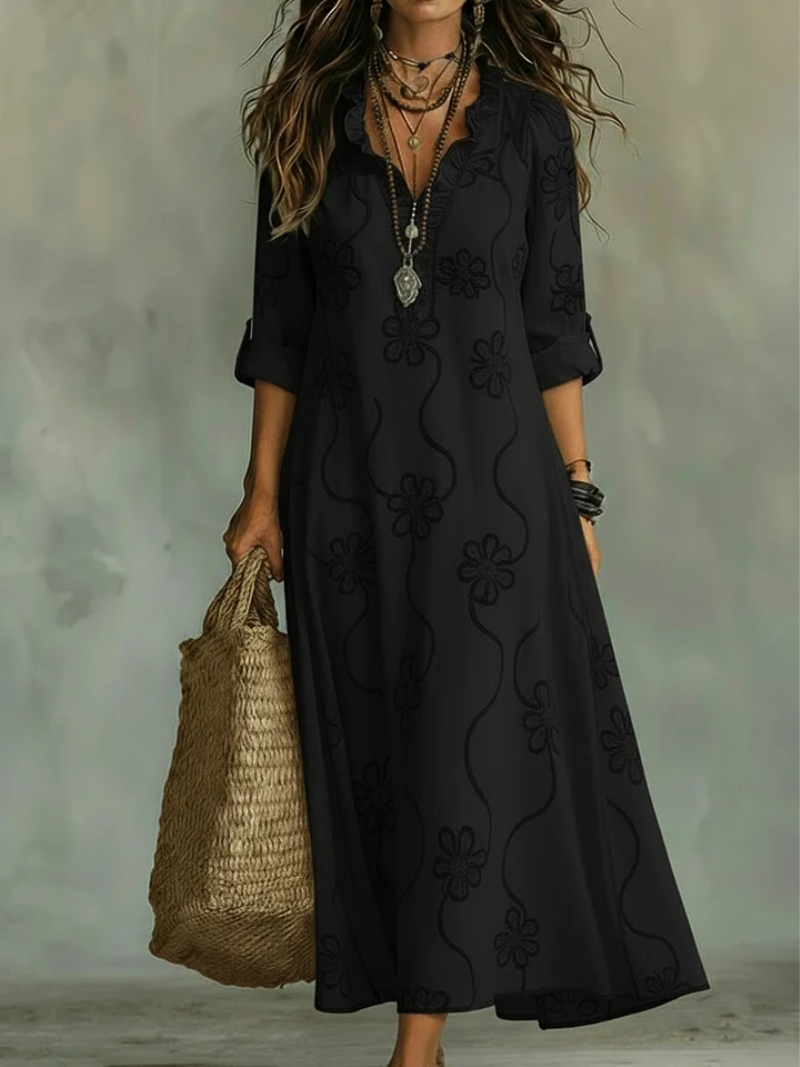 Noor – Jurk met borduurdetails en V-hals
