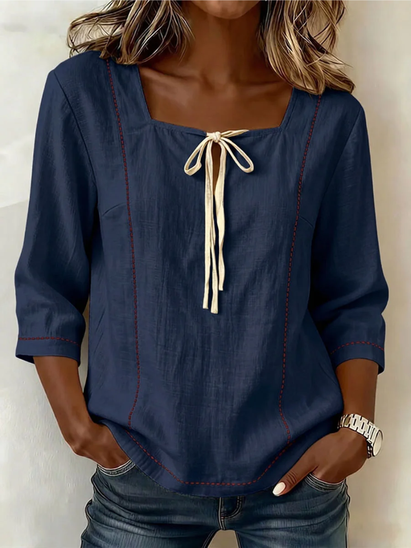 Mila – Top strikdetail