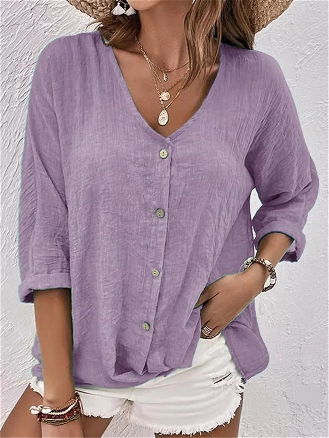 Liva – Blouse met V-hals en knopen