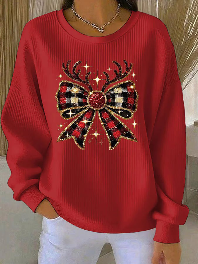 Elin - Kersttrui met strikmotief