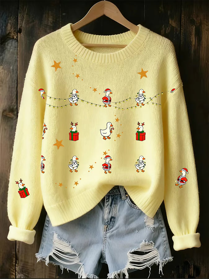 Mara – Kersttrui met speelse ganzenprint
