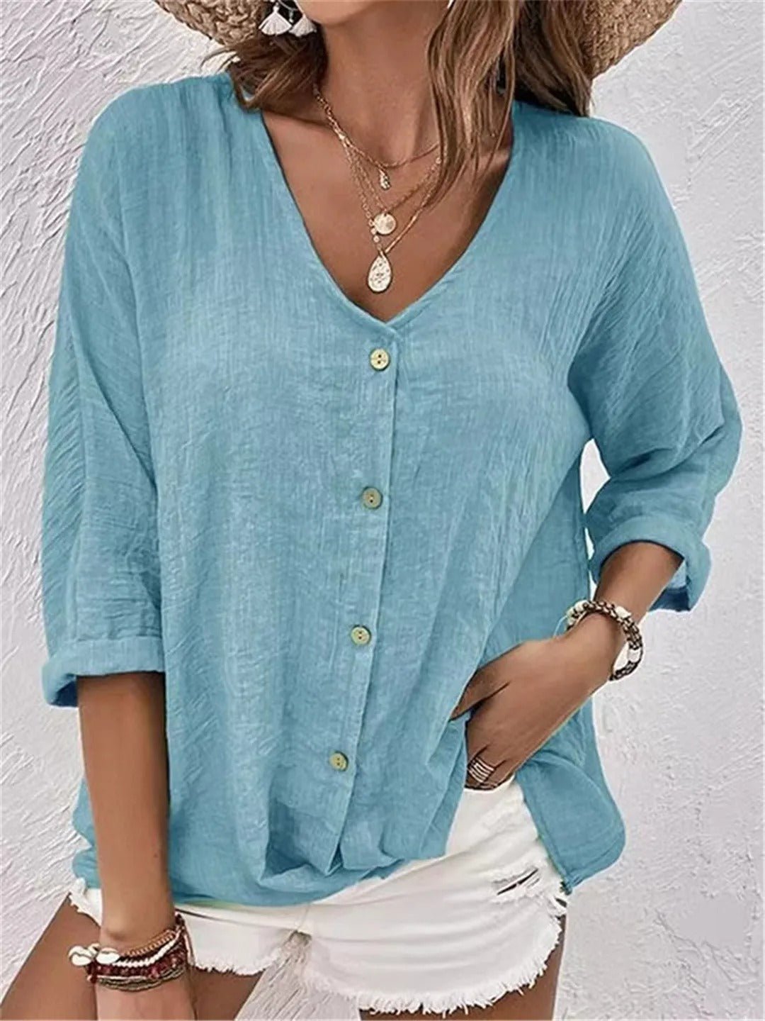 Liva – Blouse met V-hals en knopen