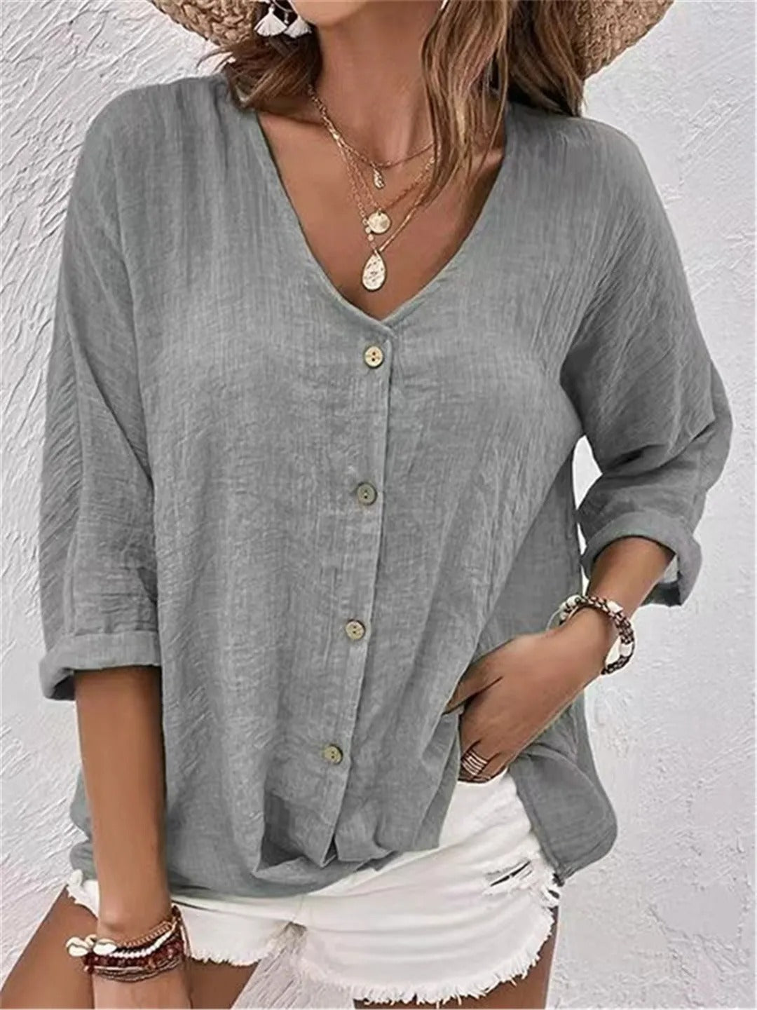 Liva – Blouse met V-hals en knopen