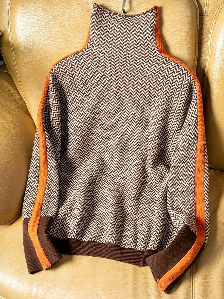 Nora – Trui met contrasterende details